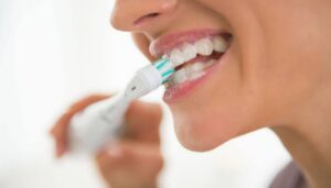 Electric toothbrush benefits in Hindi